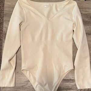 OQQ women’s long sleeve bodysuit